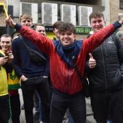 Norwich City fans depart for Leeds from Carrow Road ahead of the Championship play-off semi-final second leg at Elland Road