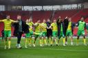 Norwich City players celebrating their 3-0 win against Stoke City before the international break
