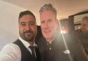 Keir Starmer and Merchants of Spice owner Nish after he enjoyed a curry at the city restaurant