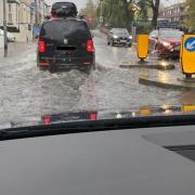 People drove through flooding in Riverside Road, Norwich, on Sunday (November 6) morning
