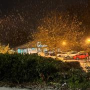 Snow falling on Thursday morning outside Pure Gym along Aylsham Road in Norwich. Picture: Reece Durrant