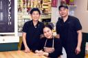 Thanida Naroewutthanul, left, and her husband, Thutchakorn, right, with their niece Phurita Phimolmas in their newly revamped Thai restaurant Mango-T