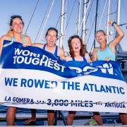 Abbey Platten, left, with her There She Rows team-mates after arriving in Antigua after 39 days of rowing