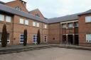 David Bassett appeared at Norwich Crown Court accused of inflicting GBH on a woman.