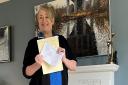 Wendy Kimberley has been invited to the Queen's funeral. Here she is pictured earlier this year with the letter confirming her as a Medallist of the Order of the British Empire (BEM)