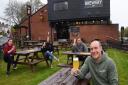 Owner Mark White, front, with from left, Charlotte Cole, Charley Austin, and Dan Arden, test the beer ready for the reopening of the Brewery Tap on Monday when lockdown restrictions are relaxed.
