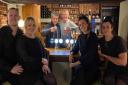 Hugh Bonneville (third from right) who plays Lord Grantham in the hit TV series wined and dined in The Crown Inn, in Pulham Market, on Thursday evening [November 11].