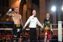 Joe Steed's hand is raised in victory by referee Mark Bates