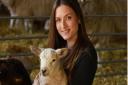 Shepherdess Bethany Atkinson, 26, with one of her lambs at Barford. Picture: DENISE BRADLEY