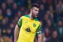 Norwich City skipper Grant Hanley is set to return from suspension