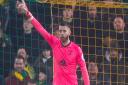 Norwich City keeper Angus Gunn is poised to replace the injured Tim Krul at Watford