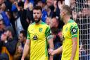 Grant Hanley and Ben Gibson, right, get that sinking feeling after Chelsea's second goal against Norwich City
