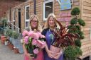 Sisters Sarah Turcu and Lisa Bolingbroke outside The Watering Can plant and gift shop at White House Farm in Sprowston