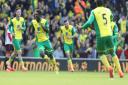 Alex Tettey and team-mates celebrate his wonder-goal against Sunderland. Picture: PA