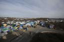 Patrick Ward has reported from numerous refugee camps during his career, but was hardest hit by an assignment to the Calais refugee camp known as The Jungle. Picture: PA Archive/PA ImagesA general view of the entrance to The Jungle refugee camp in Calais,