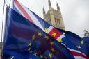 Union and EU flags fly outside Houses of Parliament. PHOTO: EMPICS Entertainment