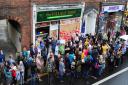 Norwich people show their support for the owners of the fire attacked Village Shop in Magdalen Street and show that they won't stand for racism in Norwich. Photo: Simon Finlay