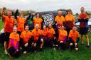 13 of the members of Bootcamp Fitness who took part in the Mucky Race