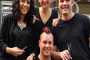 Brian Coombes, right, and his team, from left, Tatiana Matthews, Rebecca Dean, and Charlie Street, front, ready for their 24 hour hairdressing and manicures marathon. Picture: DENISE BRADLEY