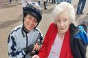 Marjorie Bubb meets jockey Hayley Turner at Great Yarmouth Racecourse