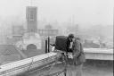 Cameraman on roof with St. Andrew\'s Church in the background BBC film unit at Norfolk News Company Redwell Street filming a day in the life of a newspaper in 1960