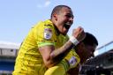 Onel Hernandez and Gabby Sara celebrate Norwich City's second goal in a 2-0 Championship win at Blackburn