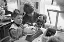 Catton Grove Infants School youngsters weighing guinea pigs in 1969