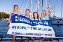 Abbey Platten, left, with her There She Rows team-mates after arriving in Antigua after 39 days of rowing