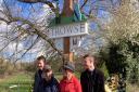 Tom Ewing, Peter Schindler, Christopher Bowers and Ben Ewing (L-R) at the unveiling of the new Trowse village sign