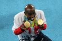 Mo Farah with his gold medals the Rio Olympics