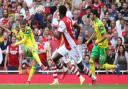 Who will start for Norwich City against Arsenal in the Premier League?