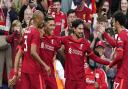 Liverpool's Roberto Firmino (third from left) celebrates scoring his side's second goal during the pre-season friendly against Osasuna at Anfield