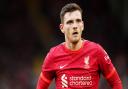 Liverpool's Andrew Robertson is a doubt for the trip to Norwich City after suffering an ankle injury