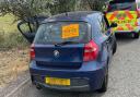 Police seized a blue BMW due to the driver not having a licence
