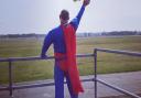One of Norwich Airport's air traffic controllers dressed up as superman to welcome back the air ambulance. Picture: Adam Gillespie