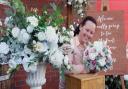 Wedding planner Charlene Goldsmith, of Goldsmith's Weddings and Events, with some of her decorations for outside weddings. Picture: DENISE BRADLEY