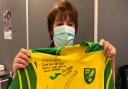 Norwich City Football Club gifted a signed shirt to vaccination staff at Norwich Community Hospital to thank them for their hard work