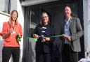 Julie Bentley (middle), chief executive of the Samaritans nationally, cuts the ribbon to open the newly refurbished Norwich Samaritans building. With her is James Ellis (right), branch manager, and Anna McNeil (left), branch operations manager