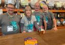 Volunteers behind the bar at the Norwich Beer Festival 2023  at The Halls