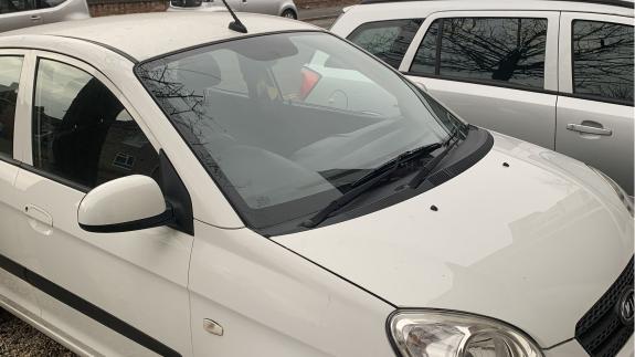 Norwich Evening News: The Kia Picanto and Vauxhall cars which were targeted in Union Street Norwich Evening News: The Kia Picanto and Vauxhall cars which were targeted in Union Street