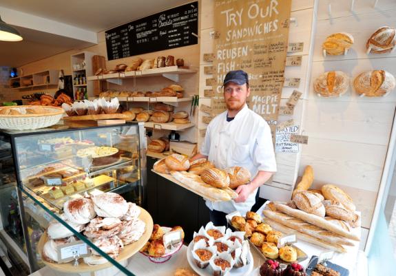 Norwich Evening News: Jim Bishop, (pictured in 2013), of the Two Magpies bakery in Southwold after it had been opened for opened only a few weeks Norwich Evening News: Jim Bishop, (pictured in 2013), of the Two Magpies bakery in Southwold after it had been opened for opened only a few weeks
