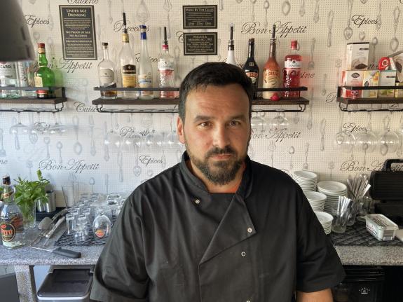 Norwich Evening News: Alfie Guerreiro, co-owner of Luso Brazilian Taste café and restaurant, said the closure of the post office was really bad for the area Norwich Evening News: Alfie Guerreiro, co-owner of Luso Brazilian Taste café and restaurant, said the closure of the post office was really bad for the area