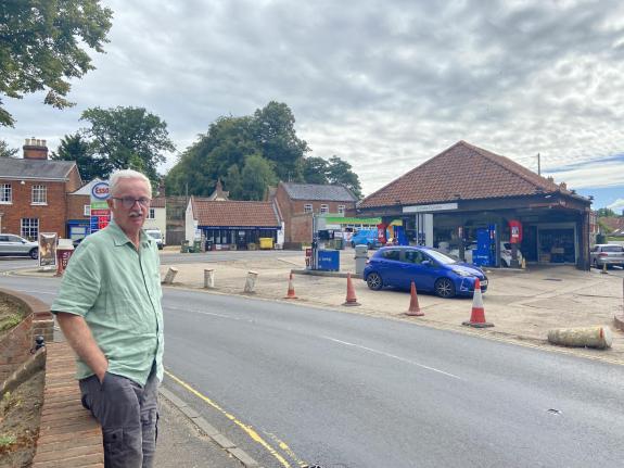 Norwich Evening News: Bill Musson next to one of the village's pinch points, where several bollards have already been knocked down Norwich Evening News: Bill Musson next to one of the village's pinch points, where several bollards have already been knocked down