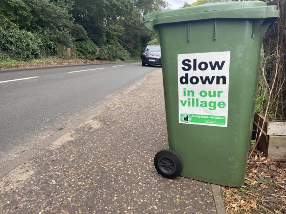 Norwich Evening News: Signs in the village ask drivers to slow down Norwich Evening News: Signs in the village ask drivers to slow down