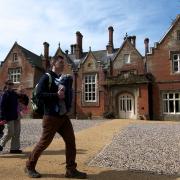 Norfolk County Council has agreed to sell Holt Hall to a mystery bidder.