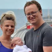 Norfolk Norfolk District Council leader Tim Adams with fiance Amanda and their newborn baby Ella