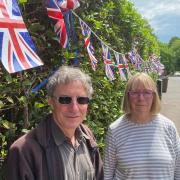 Dave Plummer and Jane Kennedy of the Bracondale Residents' Association with its Jubilee bunting display