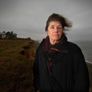 Writer Elspeth Barker on the coast at Weybourne - which was the inspiration for her story which involve the cliff, seagulls, the sea, and seaweed