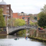 People enjoying the River Wensum in Norwich