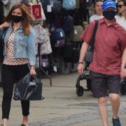 Shoppers wearing masks in Norwich city centre